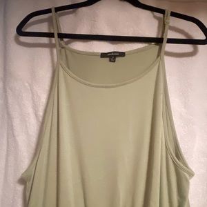 Light green jumpsuit with adjustable strap size M
